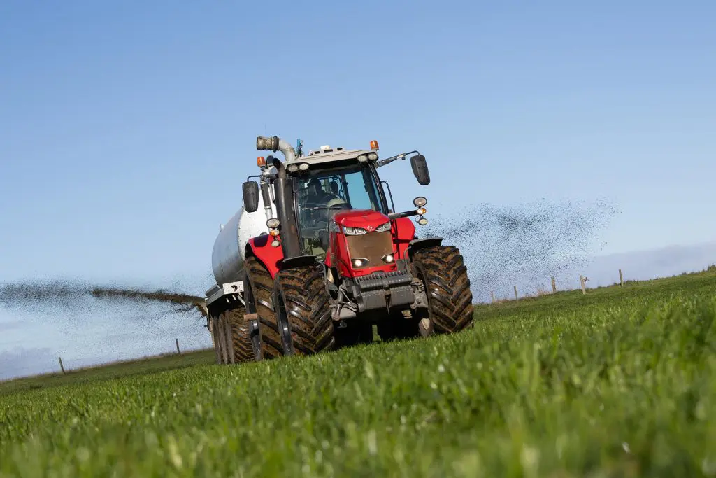 Top 5 Dairy Farmer Excuses for Buying a New Tractor 1 Red Ferdie Tractor pulling a Nevada Tridem Slurry Tanker