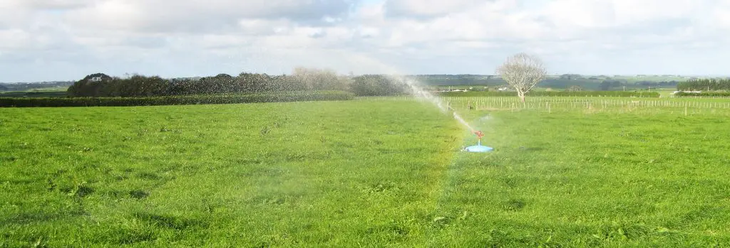 Nevada Fertigator with a rainbow in the spray