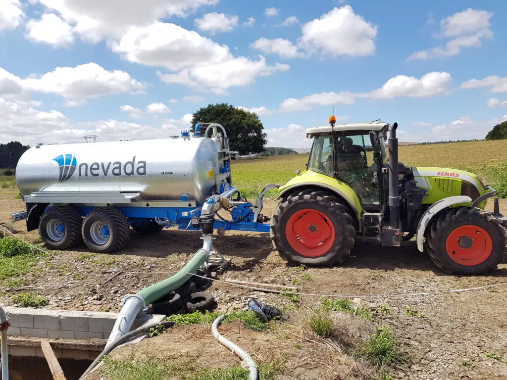 Slurry Tankers: Why a Full Chassis is Essential 2 Nevada 14700L Tandem Slurry Tanker exctracting effluent