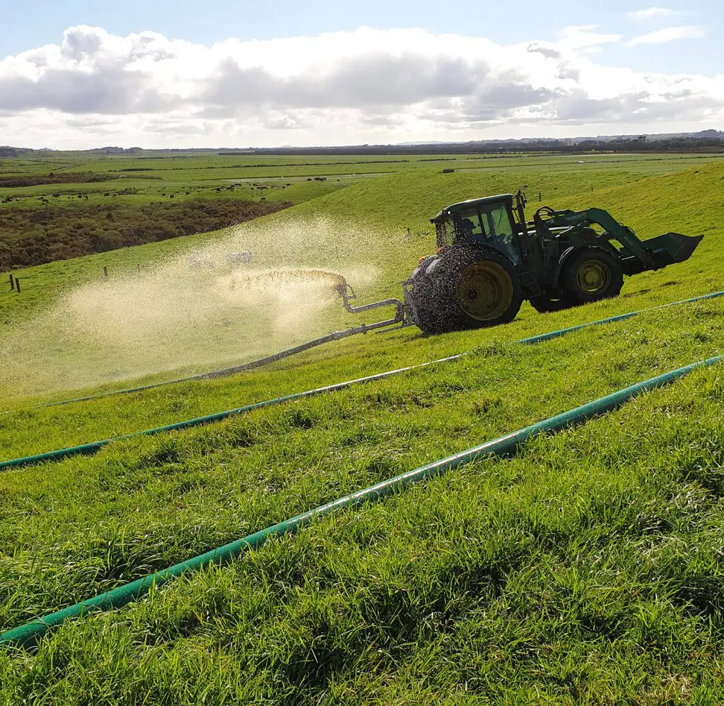 Nevada Drag Hose System with a 3PL RainWave applicator spreading effluent on a hilly paddock