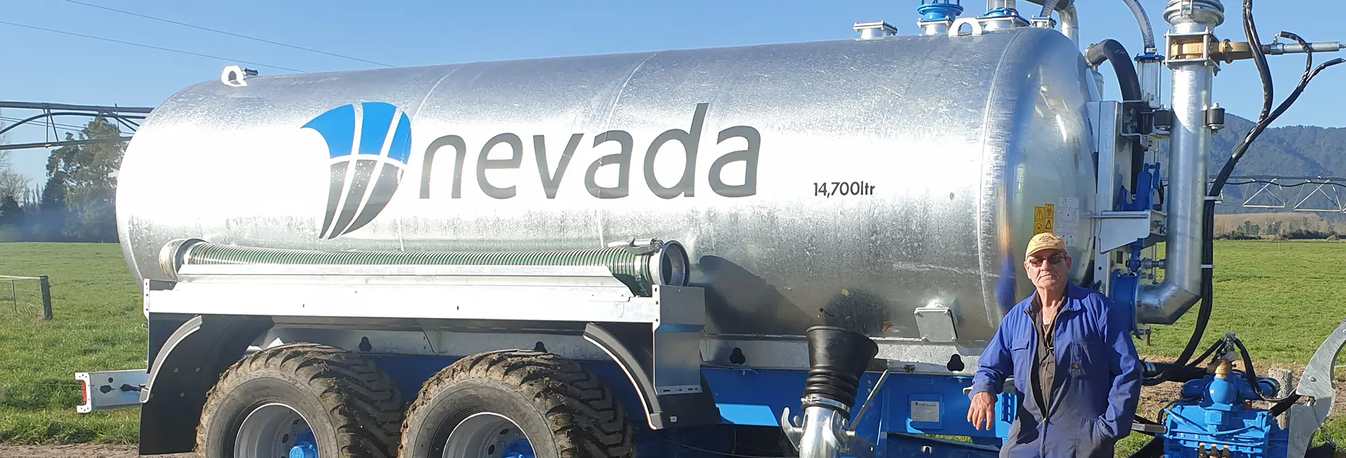 Nevada hero Gavin standing proudly in front of his Slurry Tanker