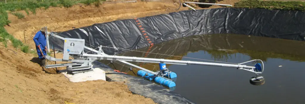 Luke's Effluent Storage Is Sorted 10 Nevada Electric Stirrer and PondBoom setup in a lined effluent pond
