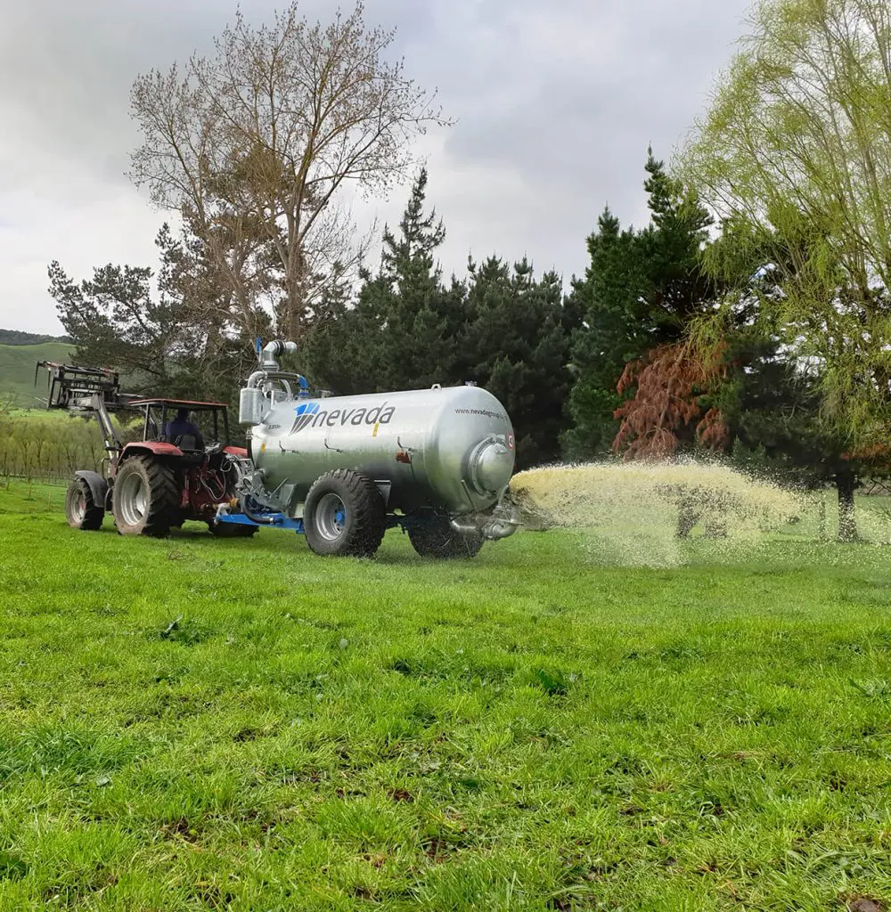Nevada Single Axle Slurry Tanker spreading effluent with a rainWave applicator