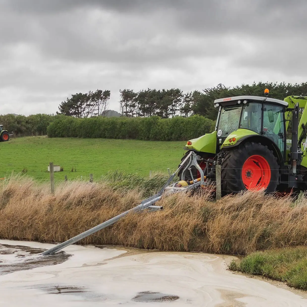 Nevada PTO Stirrer in action with a green tractor