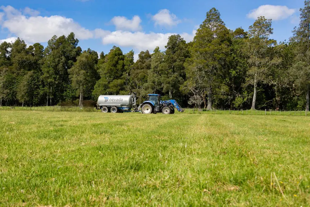 Logan Hewlett from Northland, spreading effluent with his Nevada 12800L Tandem Slurry Tanker 