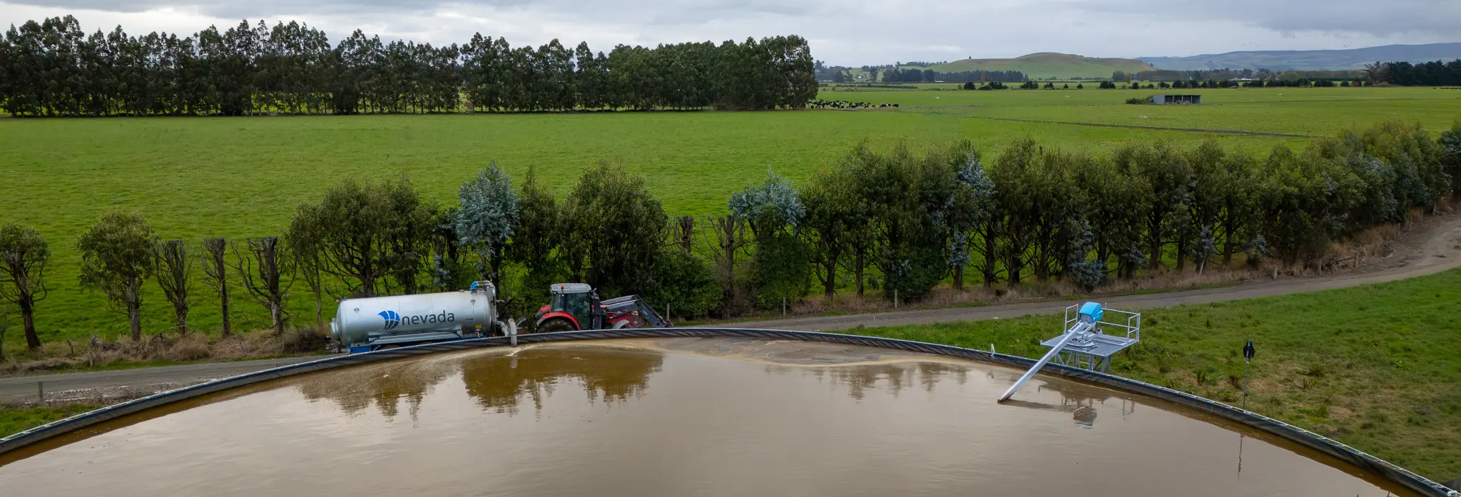 Tractor towing a Nevada Effluent Tanker while a Nevada Electric Stirrer, Stirs the KlipTank