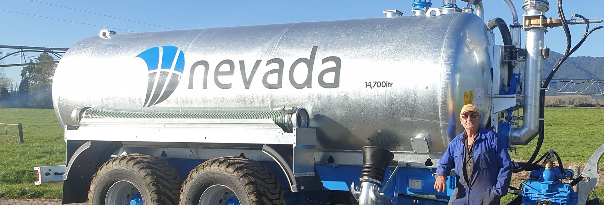 Nevada hero Gavin standing proudly in front of his Slurry Tanker