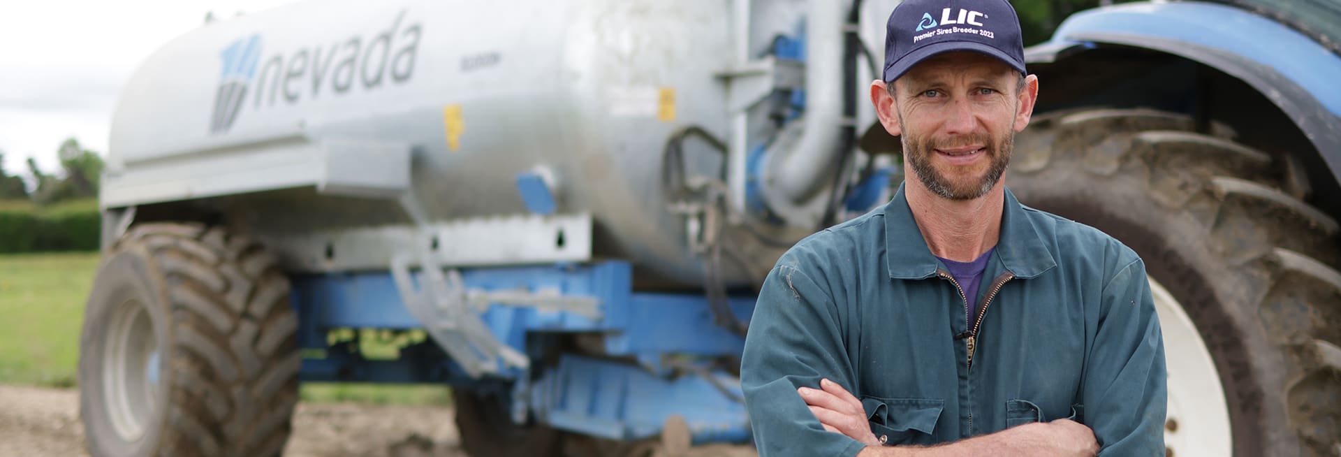 John Charlton standing proudly infront of his Nevada Single Axle Slurry Tanker
